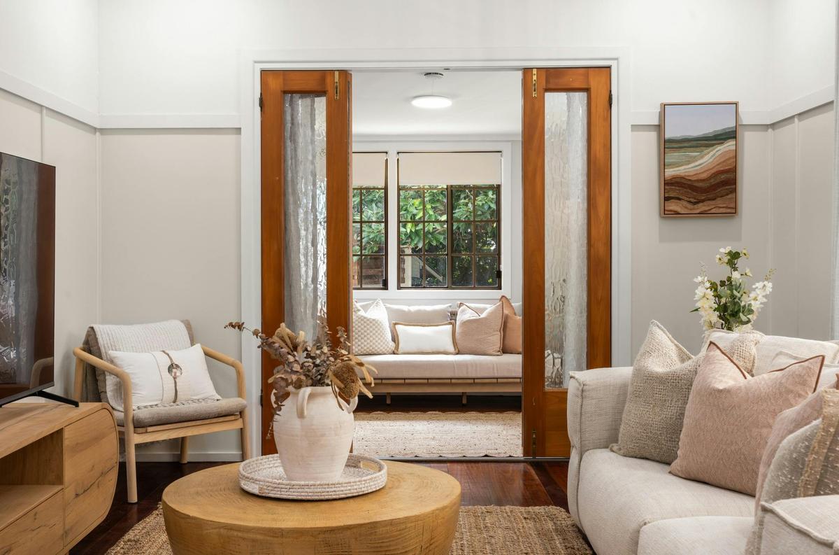 Spacious open plan living area filled with natural light