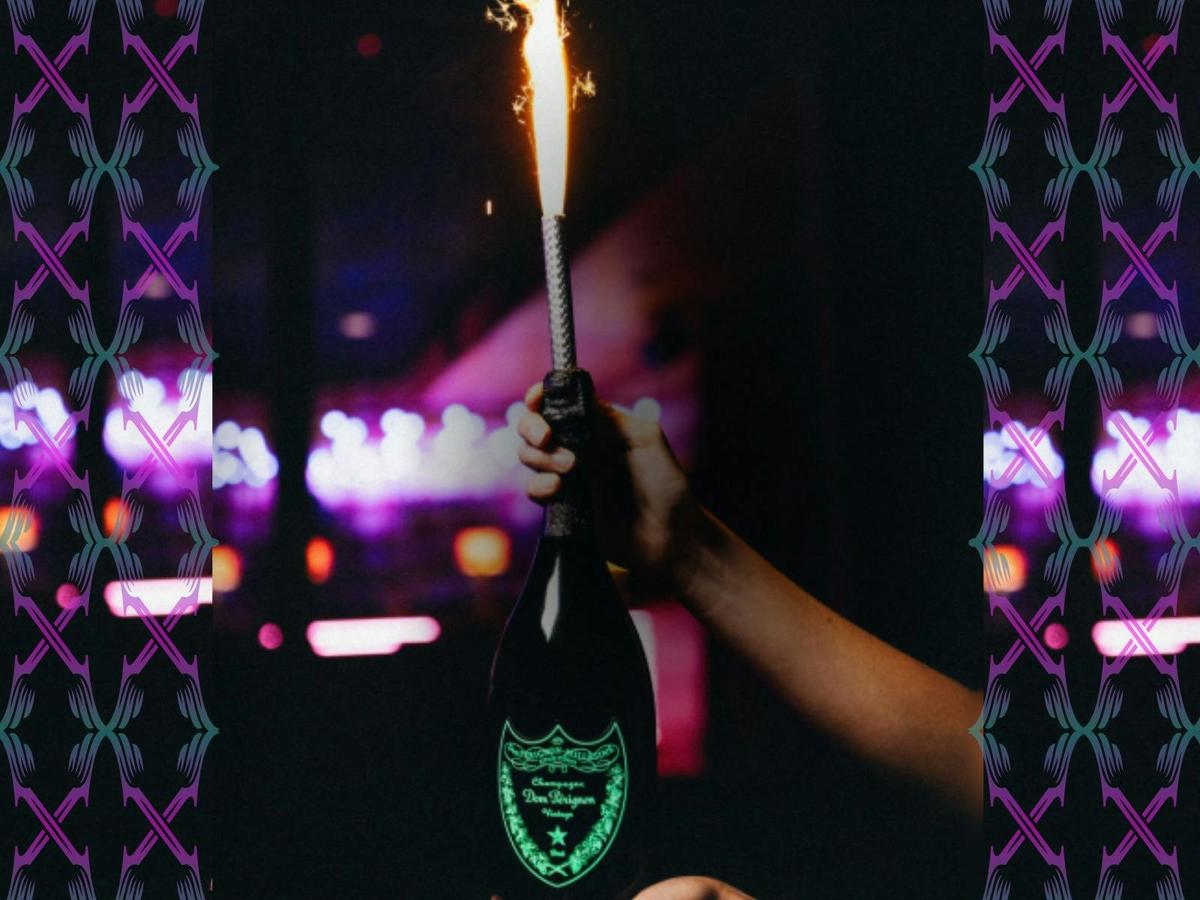 Champagne bottle service with sparkler