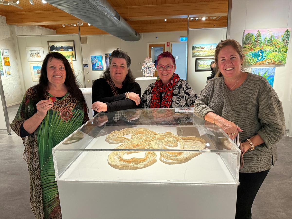 Local Artists enjoying an exhibition opening.