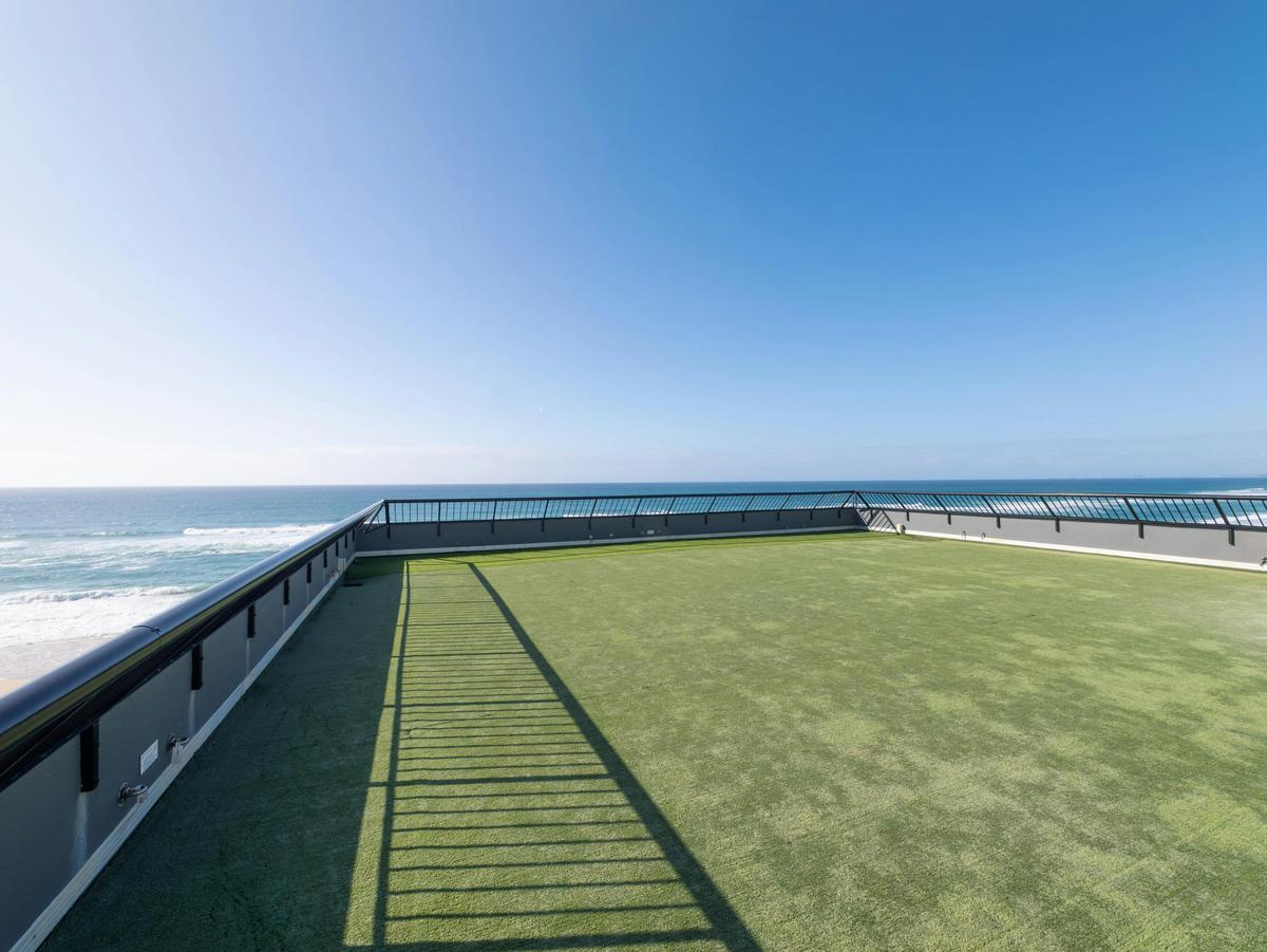 The private rooftop terrace, open to the ocean and the sky.