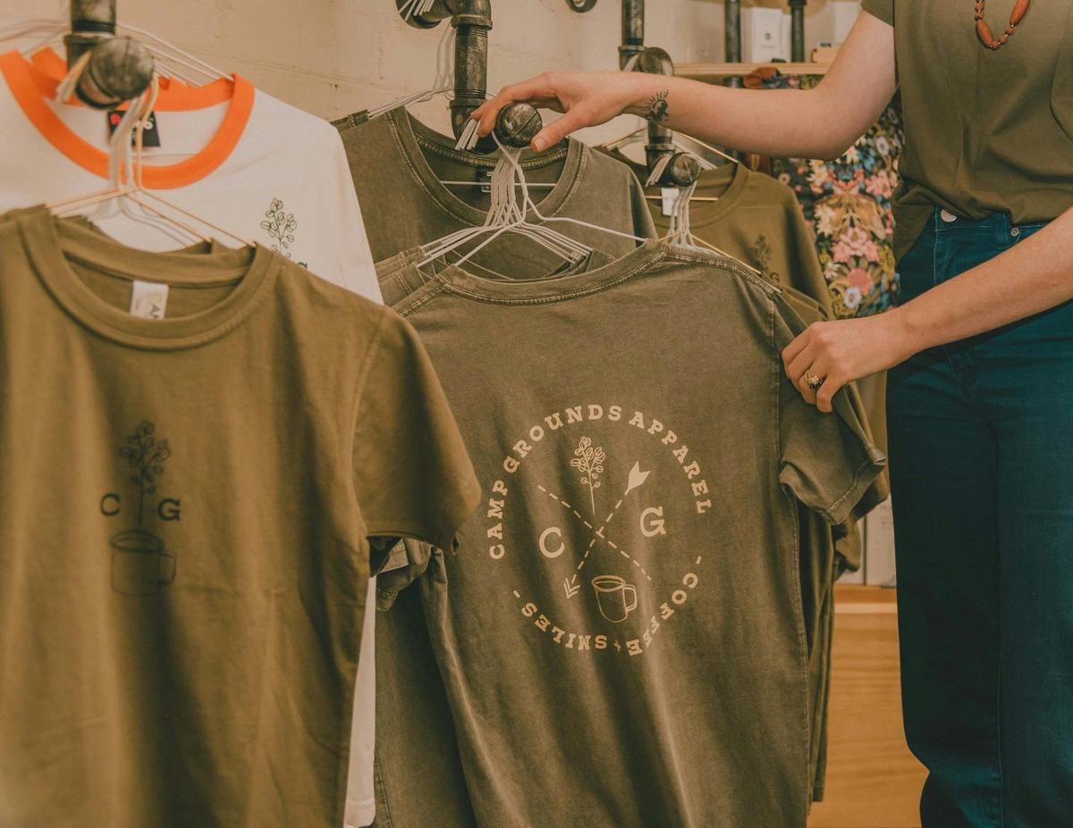 Camp Grounds Coffee Shop Apparel and Merchandise is designed by us with adventure in mind.