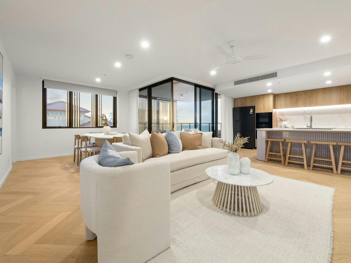 Living and dining on one open level, herringbone oak throughout.