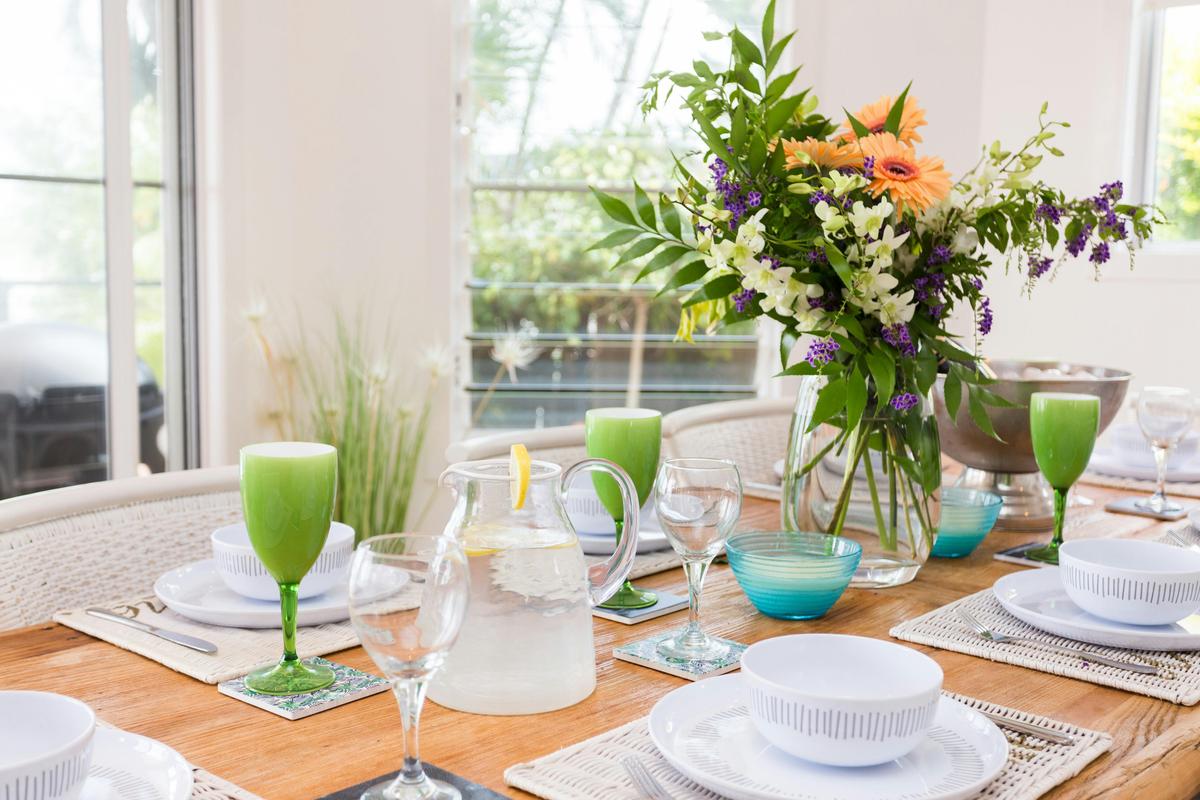 Open plan dining overlooking the pool area and Moreton Bay