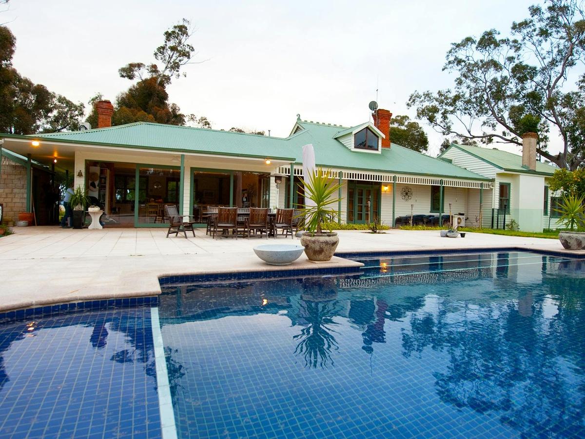 Bright on the Murray house and pool