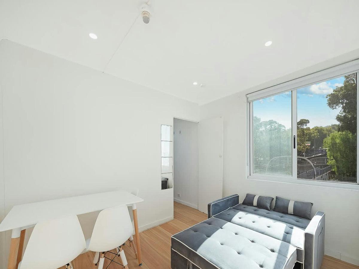 Comfortable lounge space featuring a sofa bed, ideal for relaxing during the day