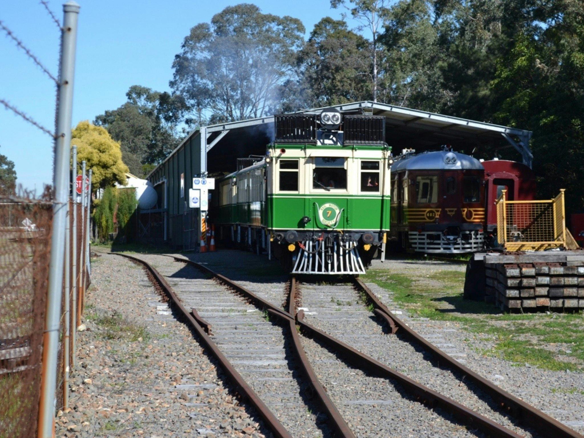 The CPH7 historic Green and cream engine and cars at Paterson Railway Station Historic  sheds