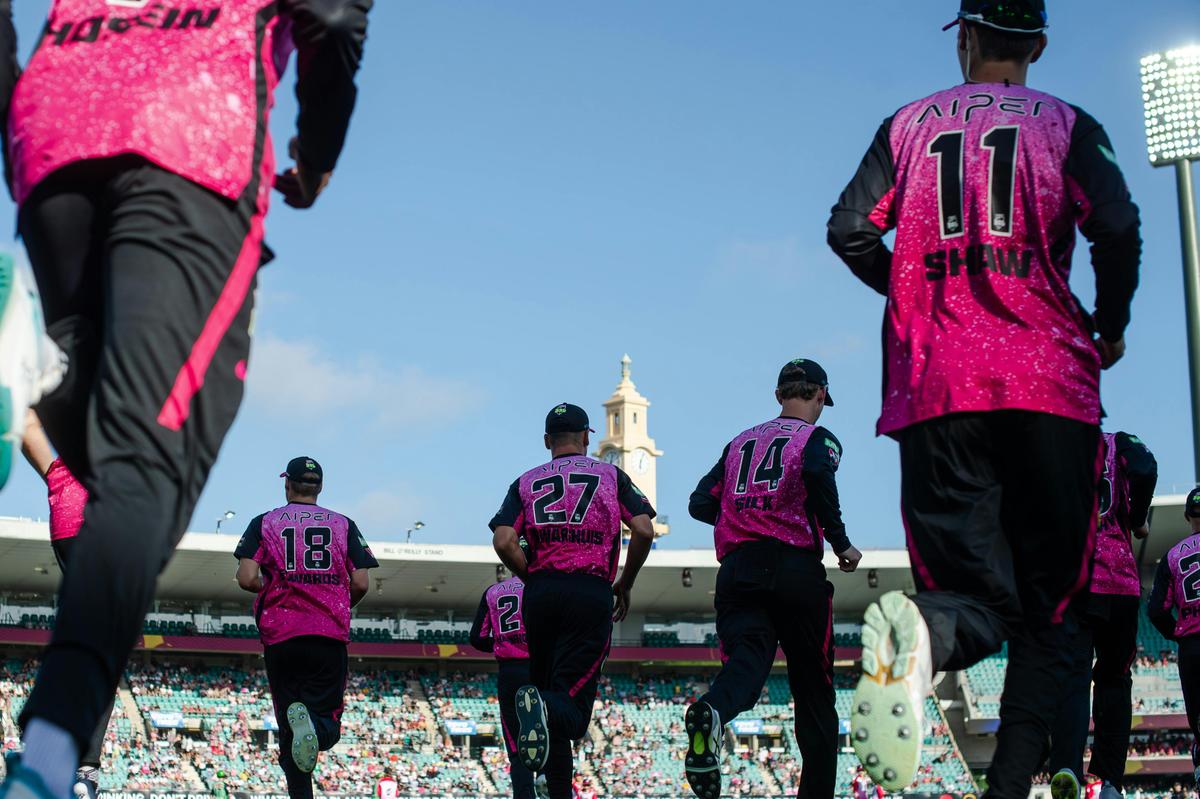 Sixers BBL team runout onto field at the SCG.