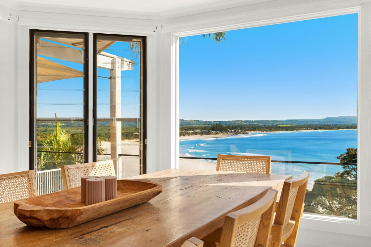 Indoor dining area with spectacular views over the Pass in Byron Bay