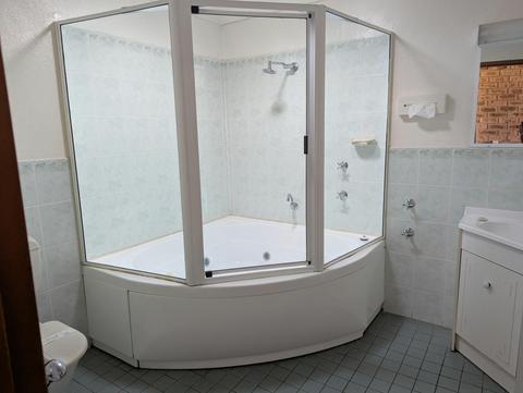 deluxe 2 bedroom family room with a spa