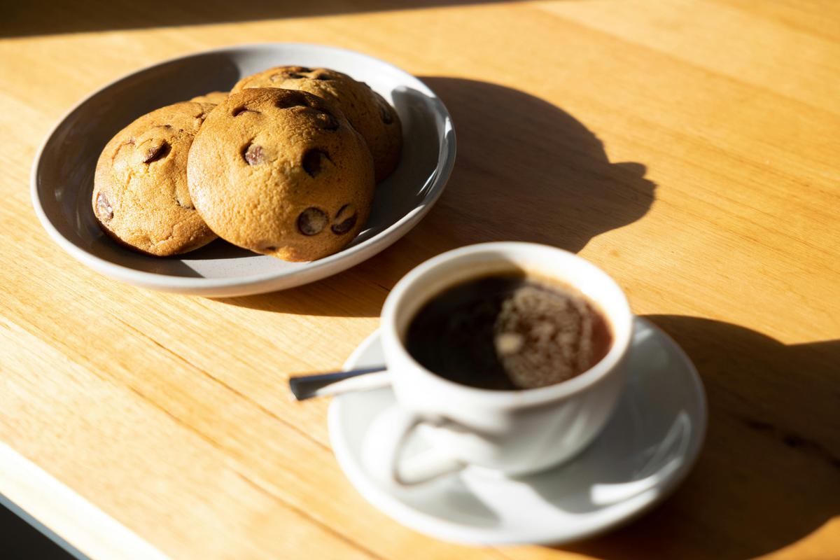 Burnt butter choc chip cookie with a long black