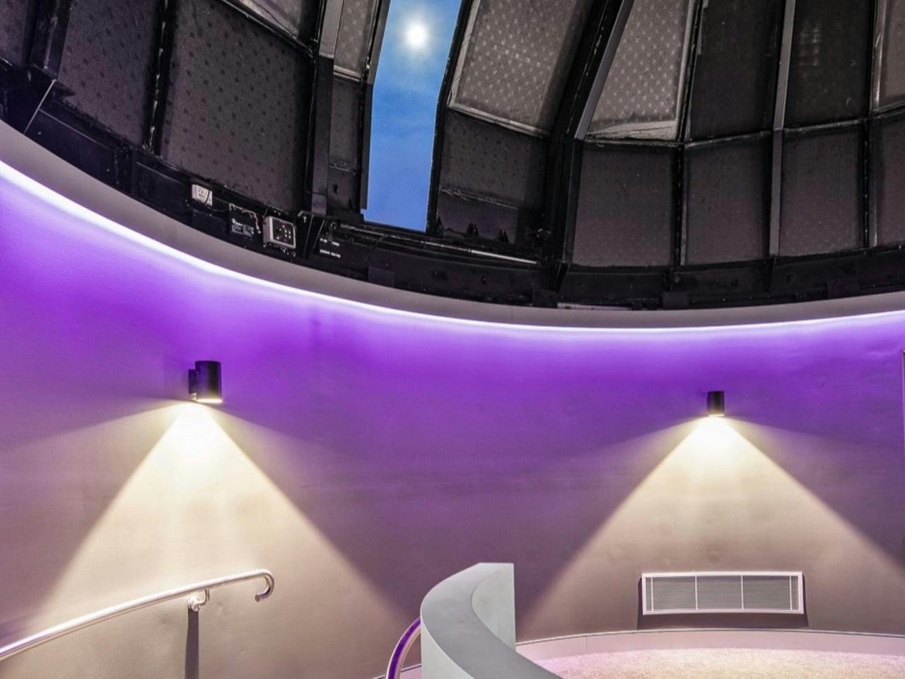 Moon showing through opening in the dome