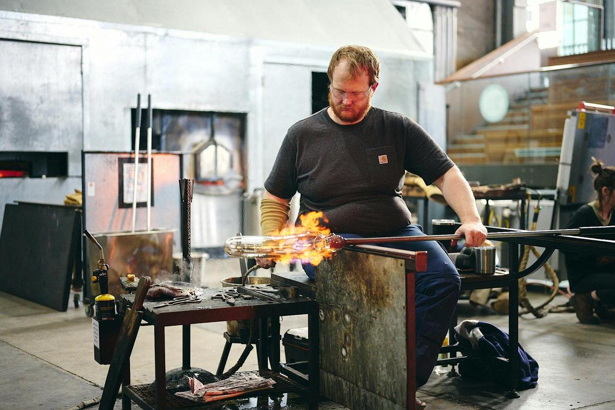 Rob Schwartz glass blowing in the Hotshop