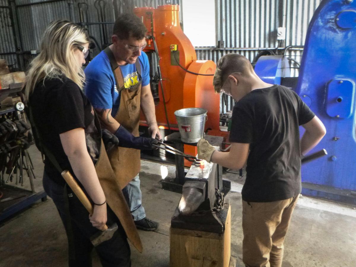 Family blacksmithing experiences in a real working forge
