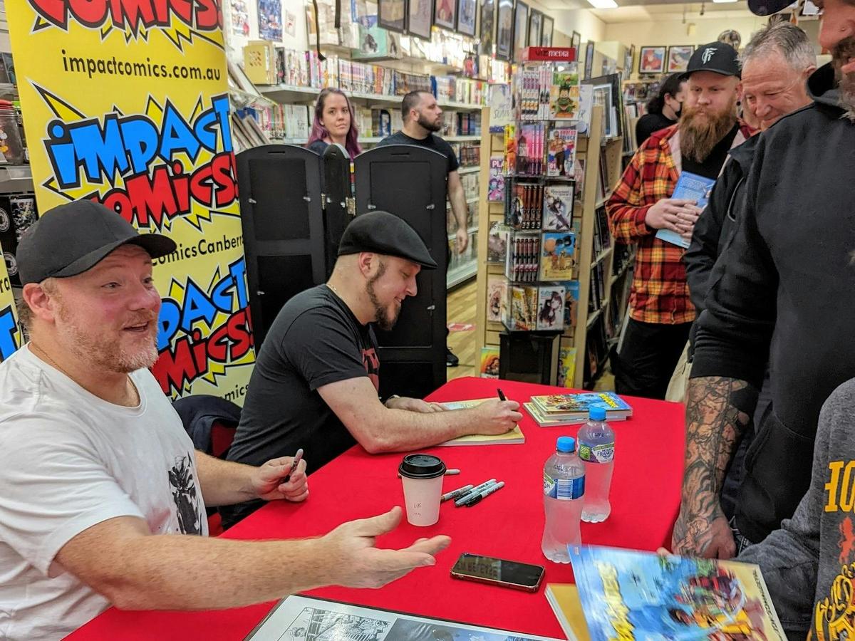 Creator Signings - Jon Sommariva and Tom Taylor signing their Graphic Novel Neverlanders