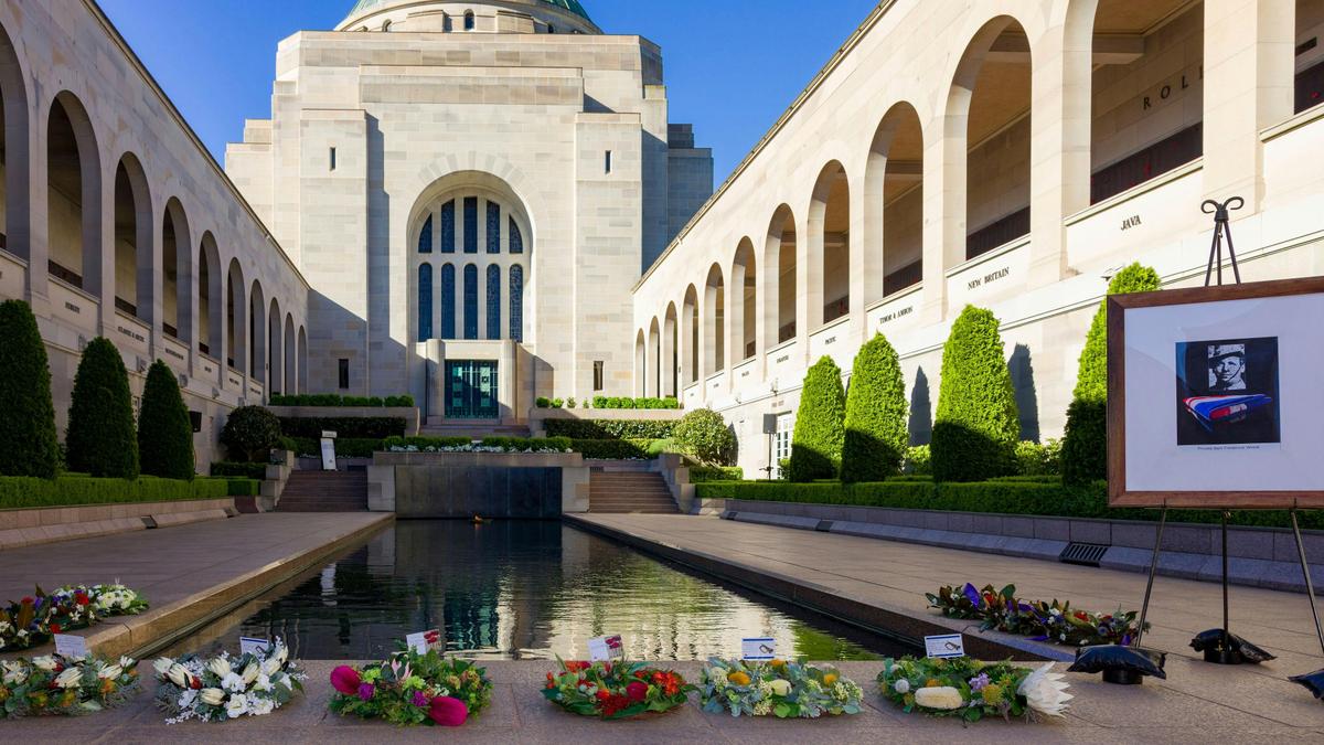 Hall of Memory and wreaths at the base of the Pool of Reflection after the ceremony.