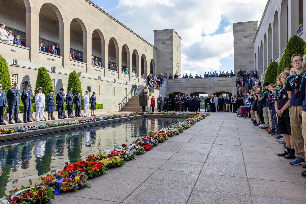 Visitors watching the Last Post Ceremony