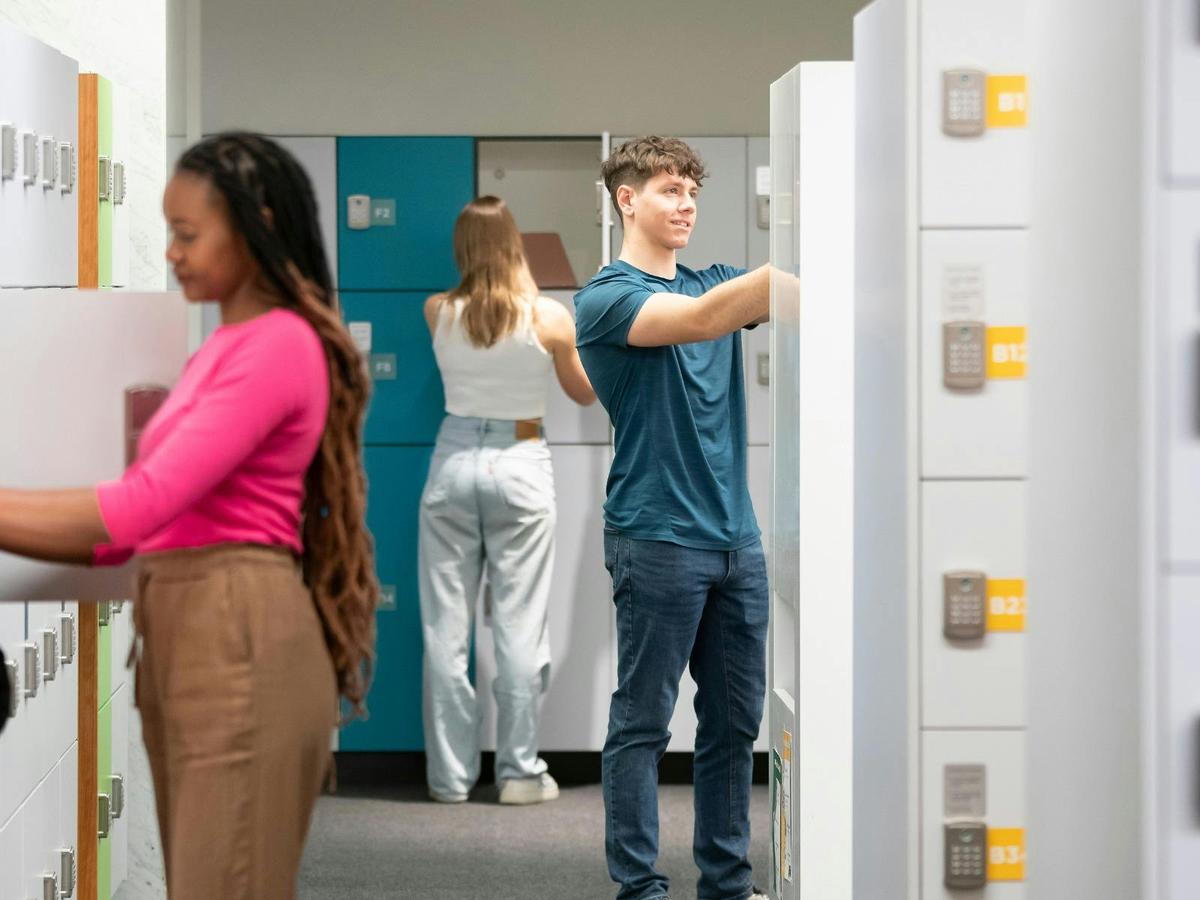 Students in the locker bay area on Lower Ground 1. National Library of Australia.