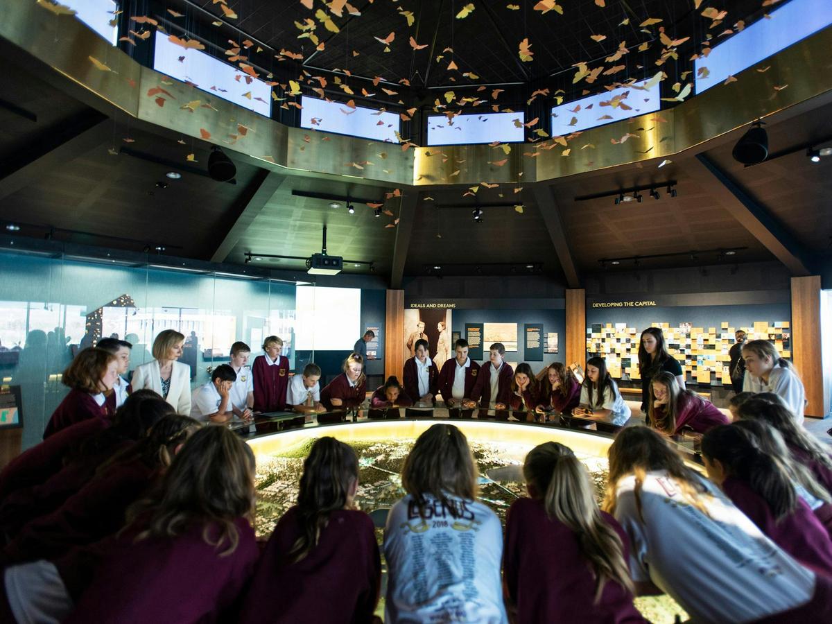 Students watching the animated presentation on the scale model of the National Capital