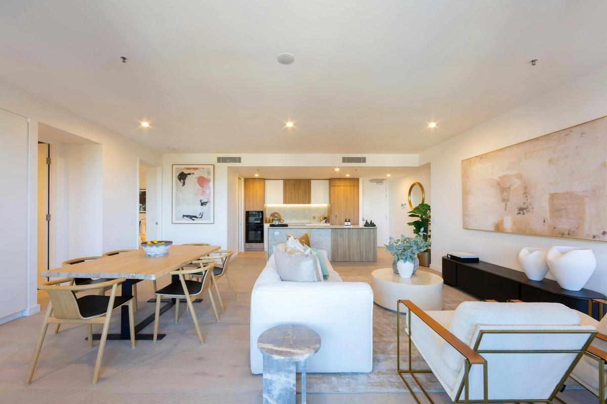 Spacious and light-filled apartment layout offering plenty of room to relax and dine.