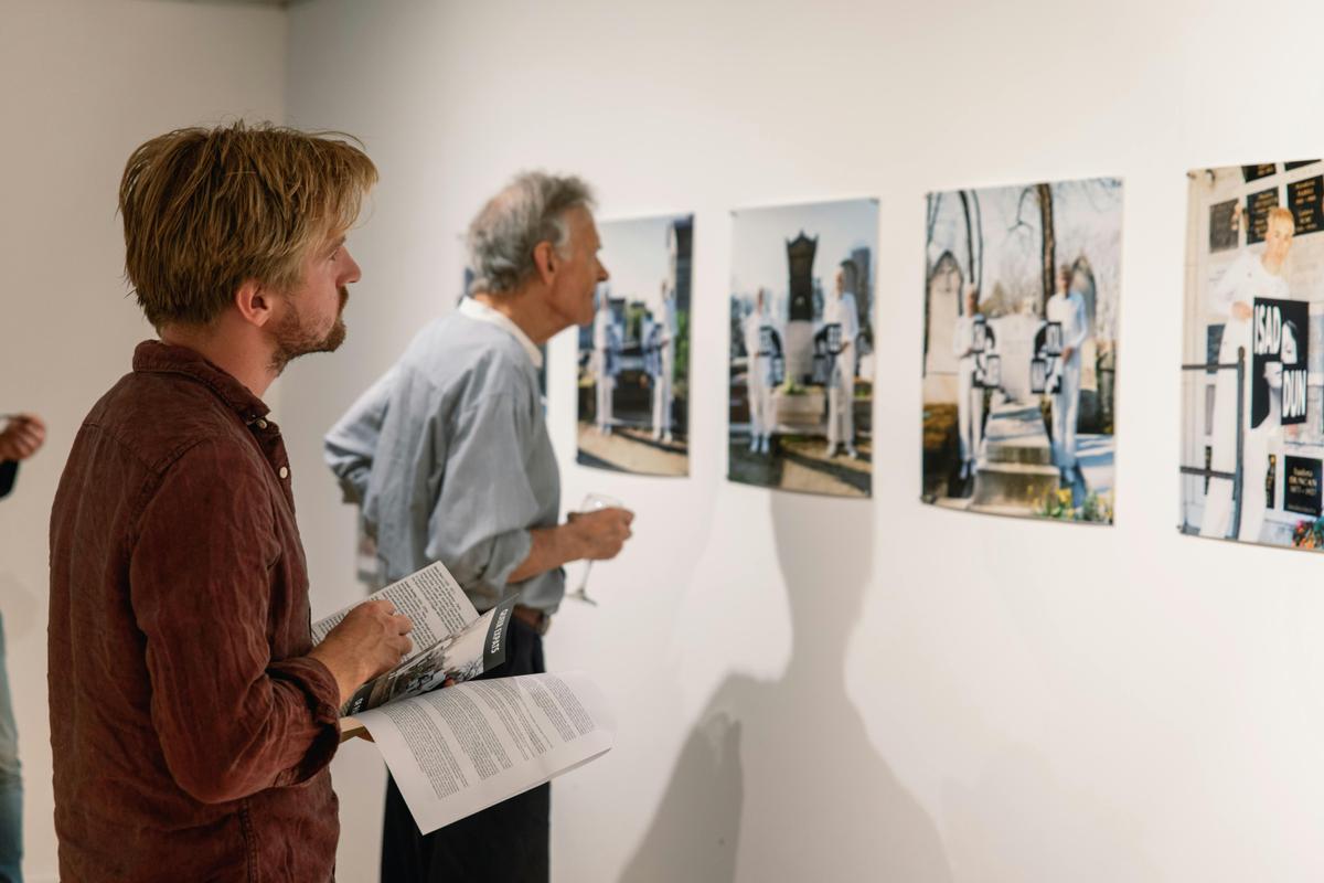 Gallery visitors at an opening
