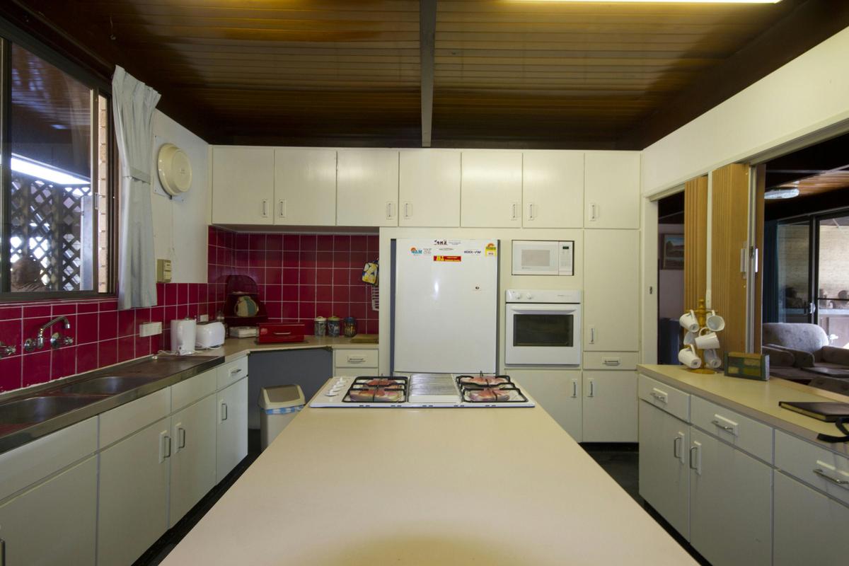one of the fully equipped kitchens