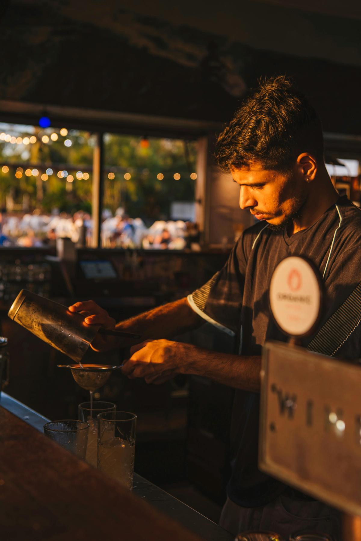 Bartender mixing drinks at the Darwin Ski Club
