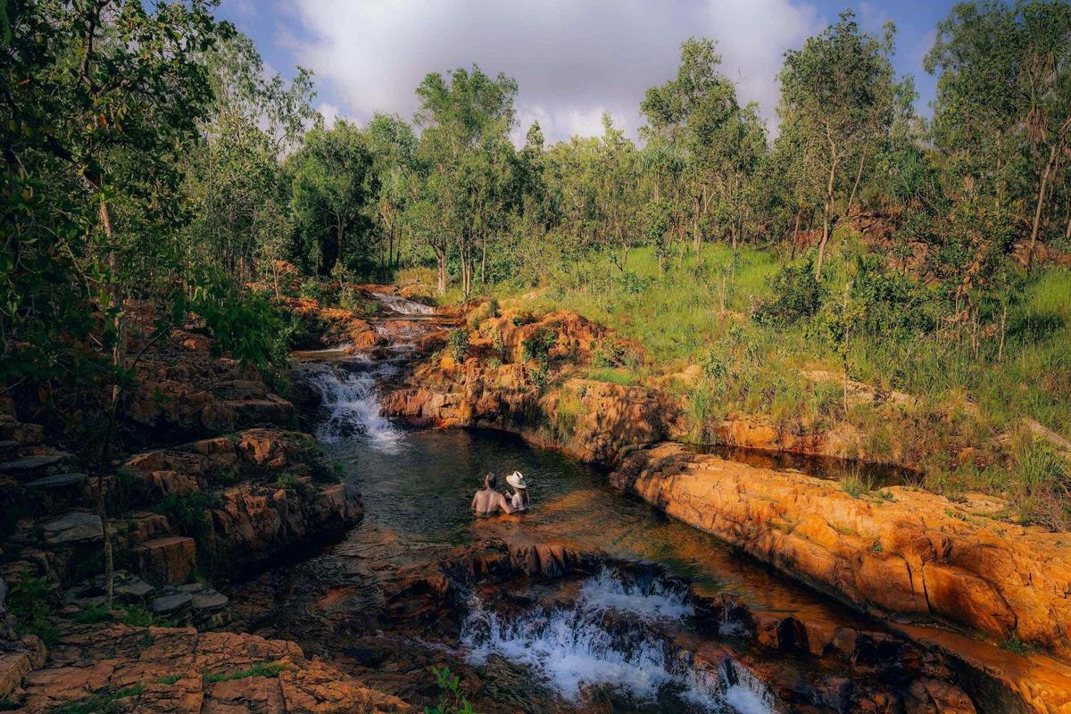 Couple swimming at Buley Rockhole in Litchfield National Park