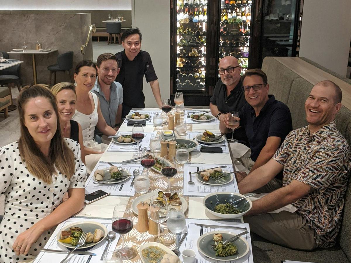 Chef Eric with guests at PepperBerry Restaurant at the Hilton
