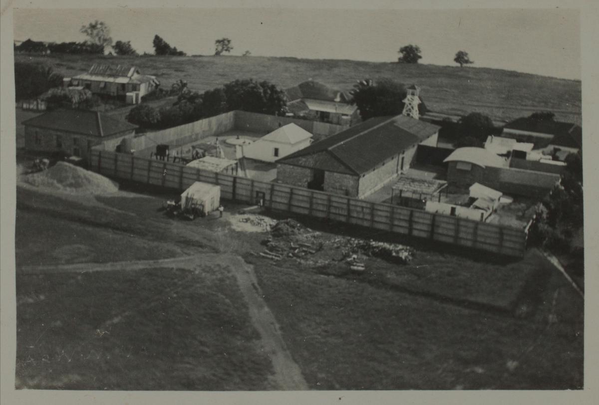 1930s Fannie Bay Gaol. Note quarry and watch tower.