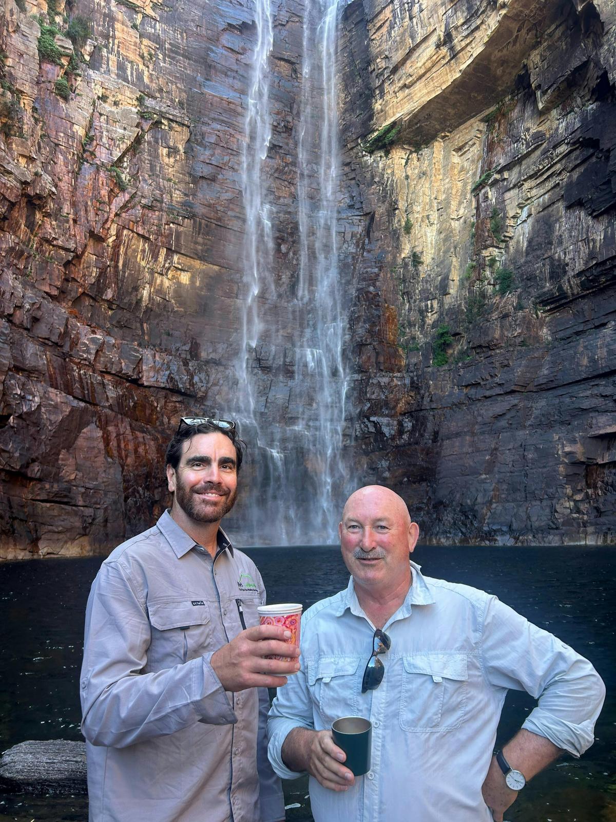 Cooling off beneath one of Kakadu National Park’s spectacular waterfalls after a rewarding walk