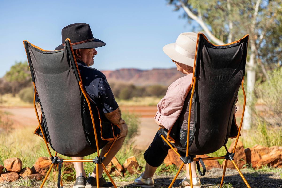 Couple sitting at Kings canyon campsite.