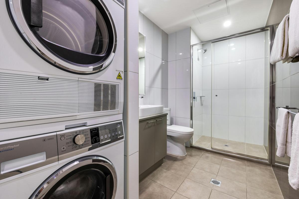 Ensuite bathroom with laundry facilities - One- and two-bedroom apartments