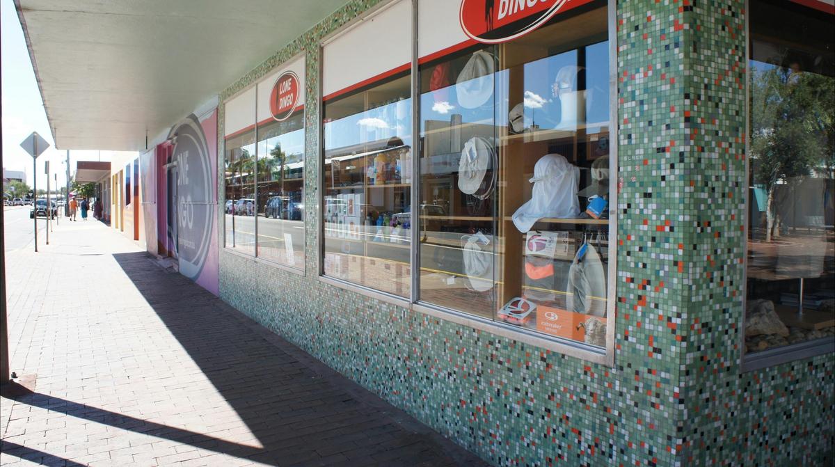 Detail view of Heenan Building, featuring original glass tiles to exterior walls.