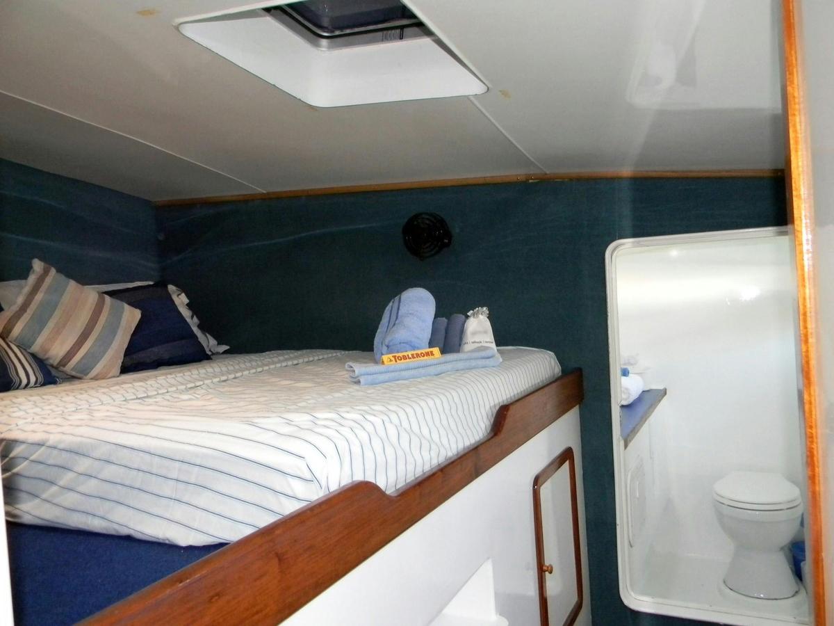 Spacious comfortable air-conditioned cabins, 2 with ensuite bathrooms