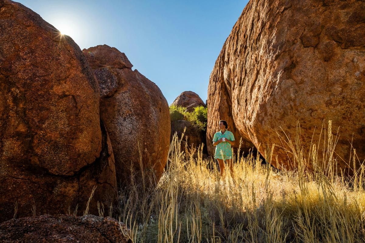 Woman exploring Devils Marbles