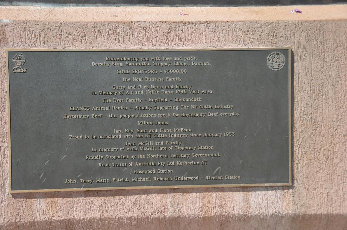 One of four commemorative plaques fixed to the memorial base.