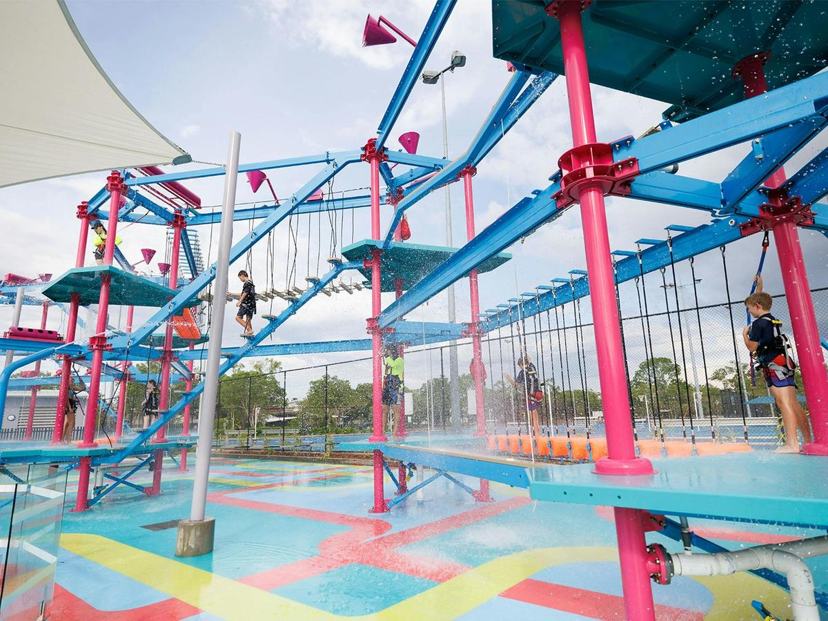 Challenge yourself on the high ropes course and try to avoid the water cannons.