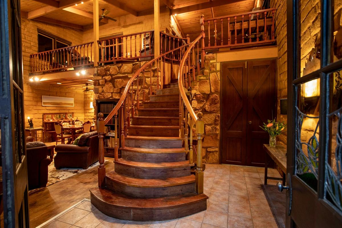 Sturt Desert Pea House - entrance with stunning urved staircase