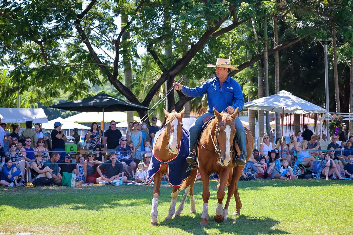 Tom performing with horses on the Darwin Waterfront for a Business Event
