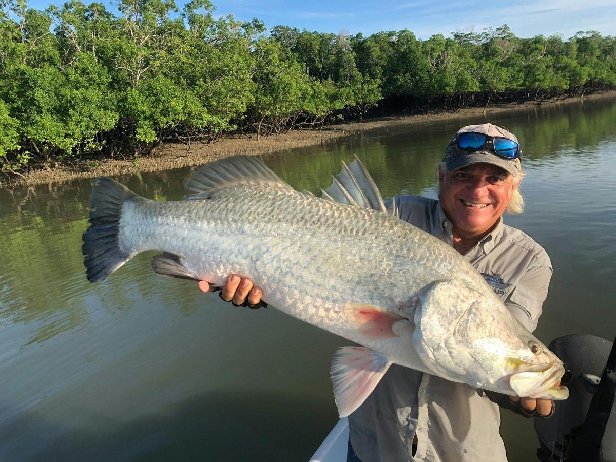 Captain Dan with a huge Barramundi caught in Arnhem Land NT river estuary