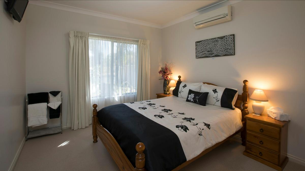 Deluxe Queen Bedroom 1