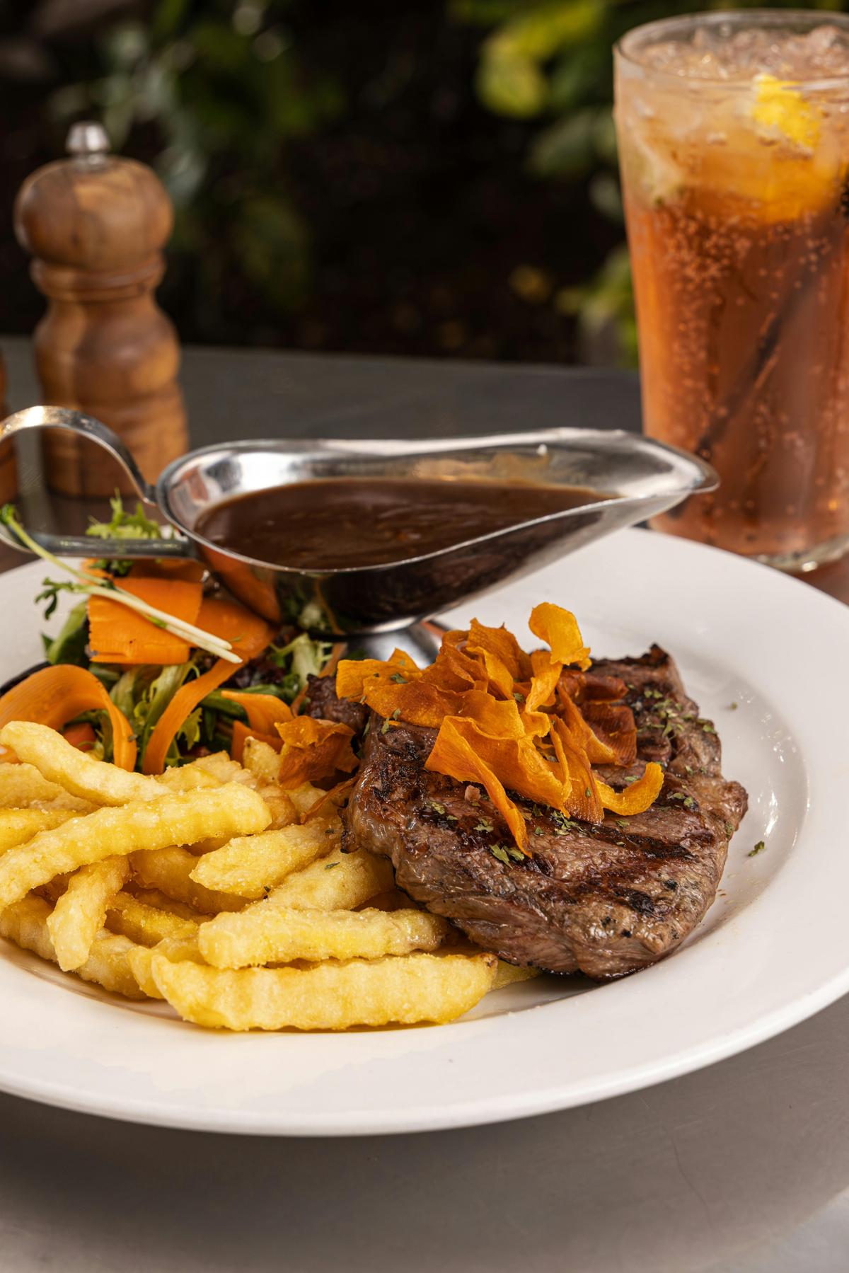 Lunch and dinner Steak salad and chips.