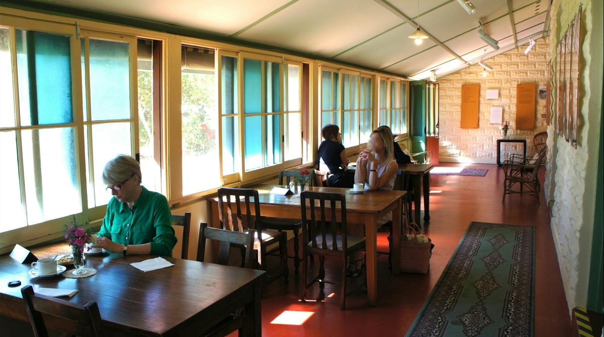 The Residency’s front verandah areas used for visitors’ cafe and informal meeting spaces.