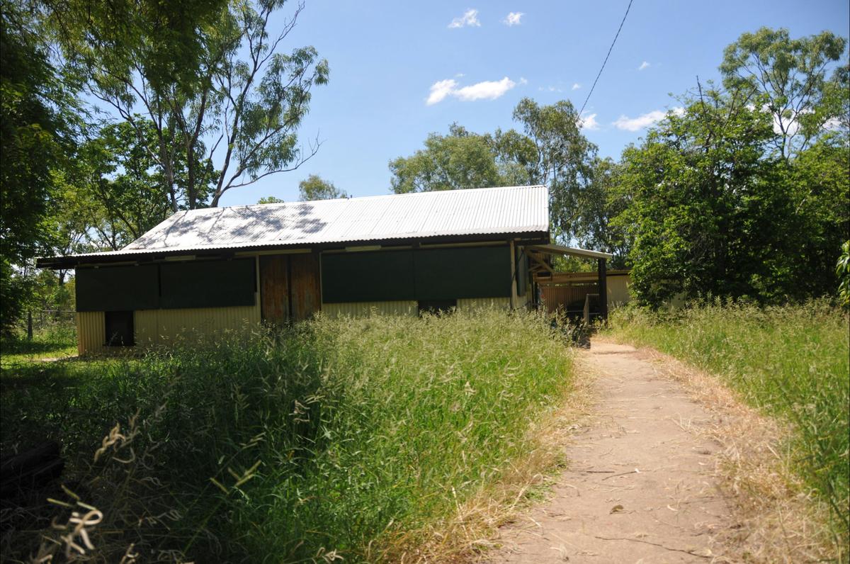 House and walkway to the house.