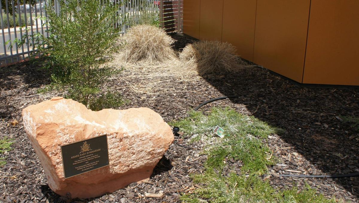 Plaque commemorating the erection of the gymnasium, located at entry to the site.