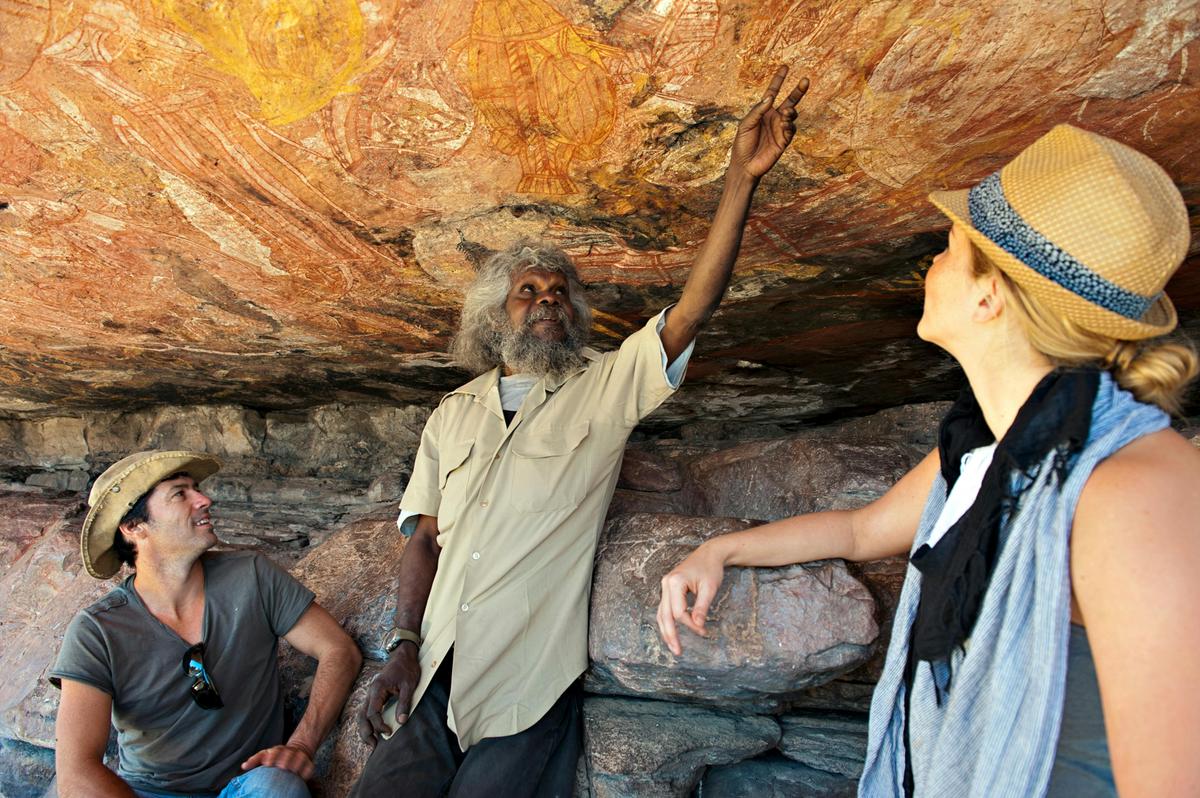 Traditional Owner (Tommo) interpreting rock art