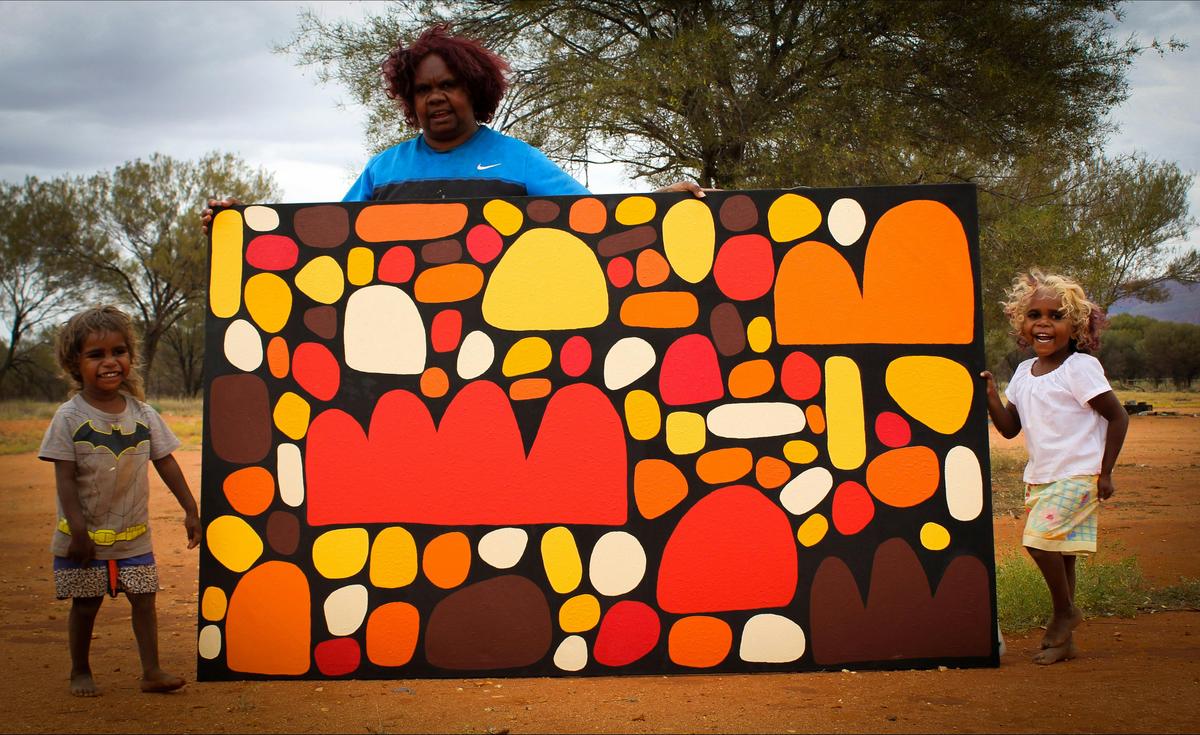 Artist Keturah Zimran with her painting 'Puli Puli'