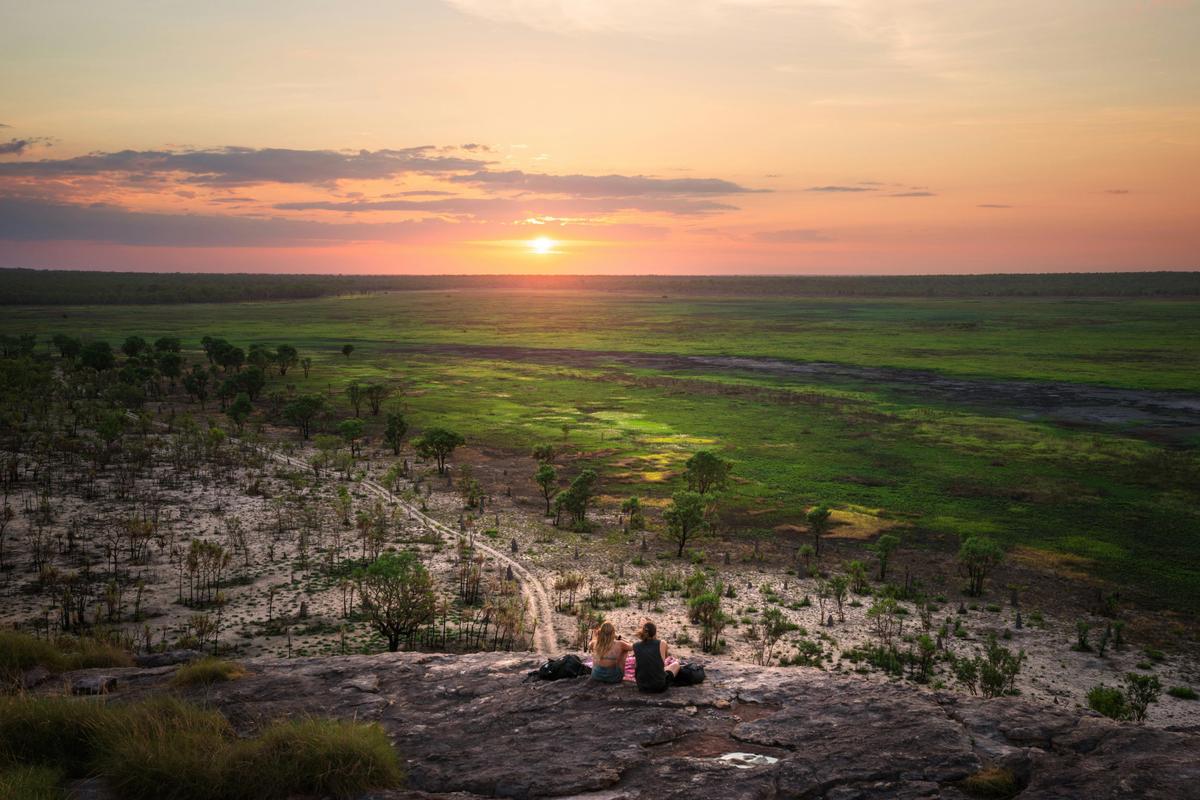 Couple enjoying the sunset at Ubirr