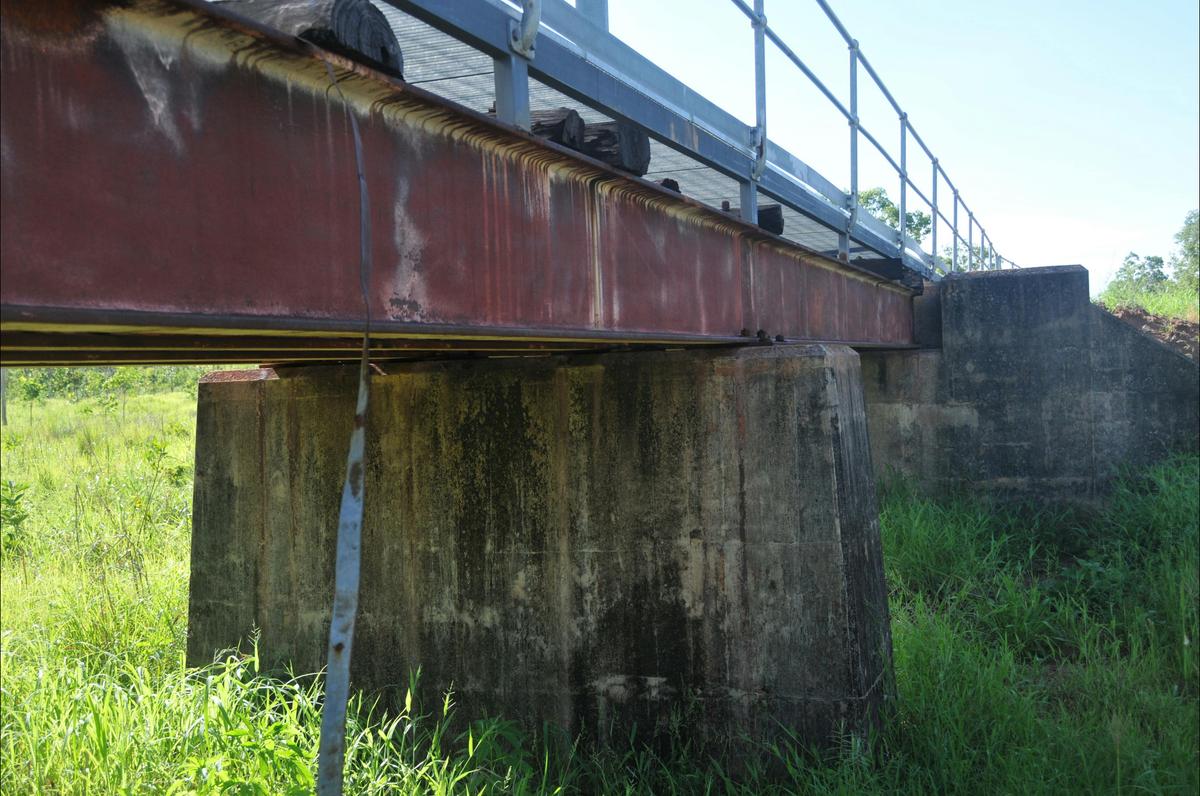 Bridge concrete pylons, steel beams and timber sleepers.