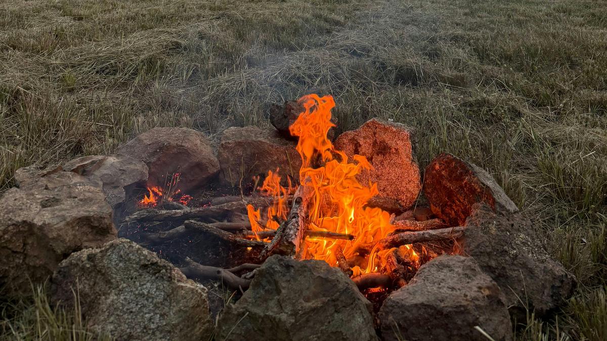 SUNSET - A simple, peaceful end to your day as you gather around the fire and enjoy the glow of the sunset through the trees.
